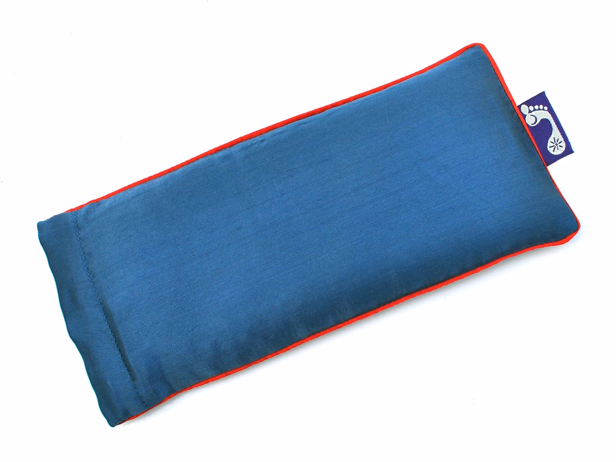 What is a yoga eye pillow used for?