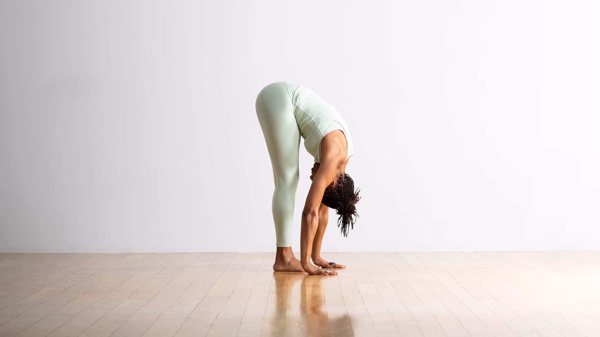 What is the forward fold in yoga called?