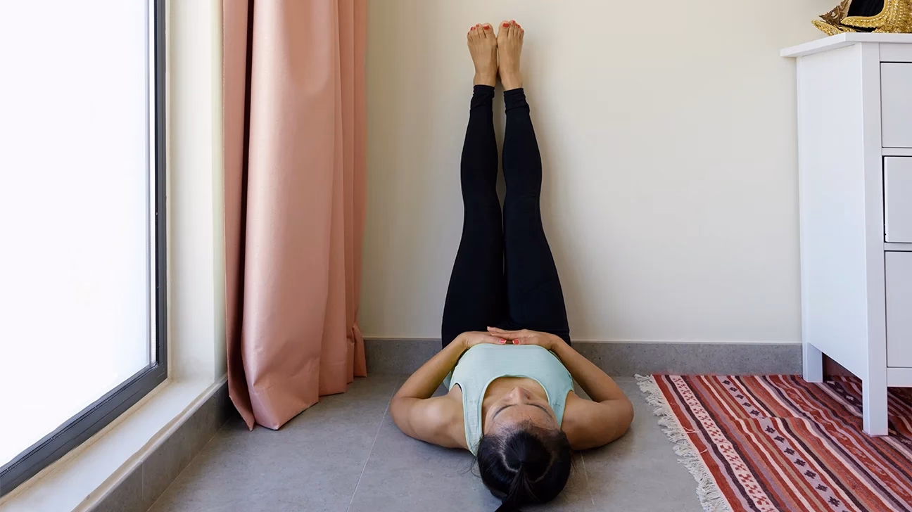 How long should you put your legs up the wall?