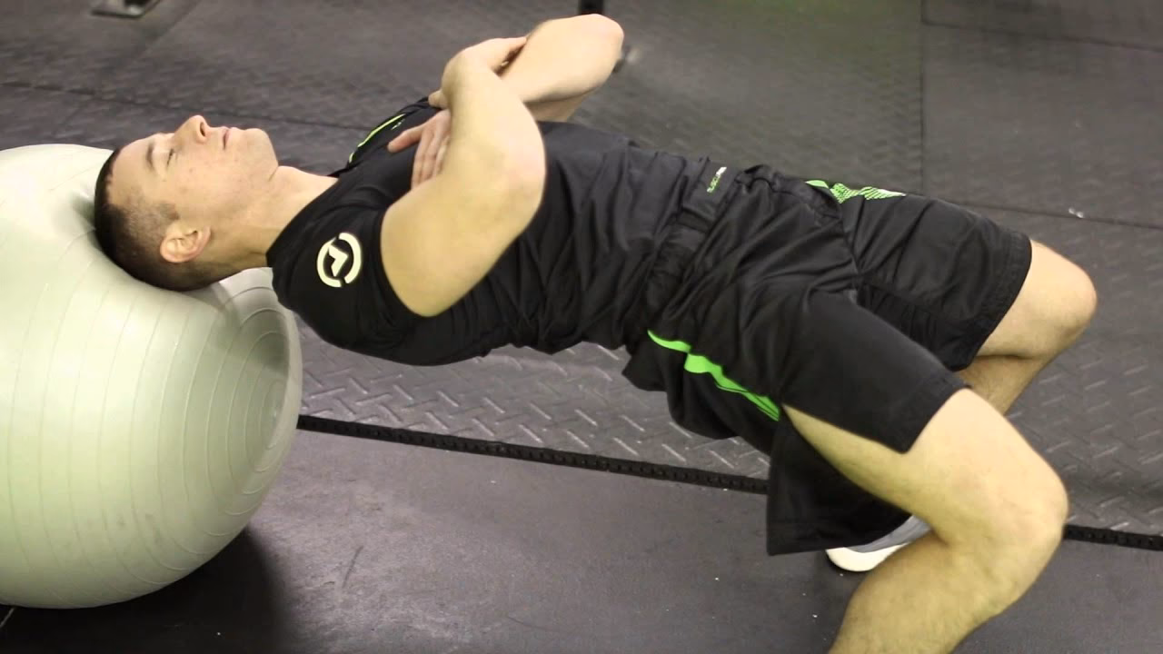 What is the ball neck rotation in Pilates?