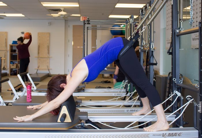How long should you hold a downward facing dog?
