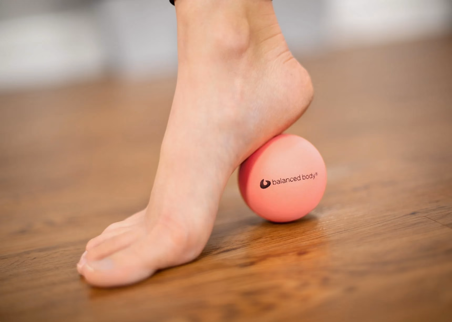 How do you use Pilates massage balls?