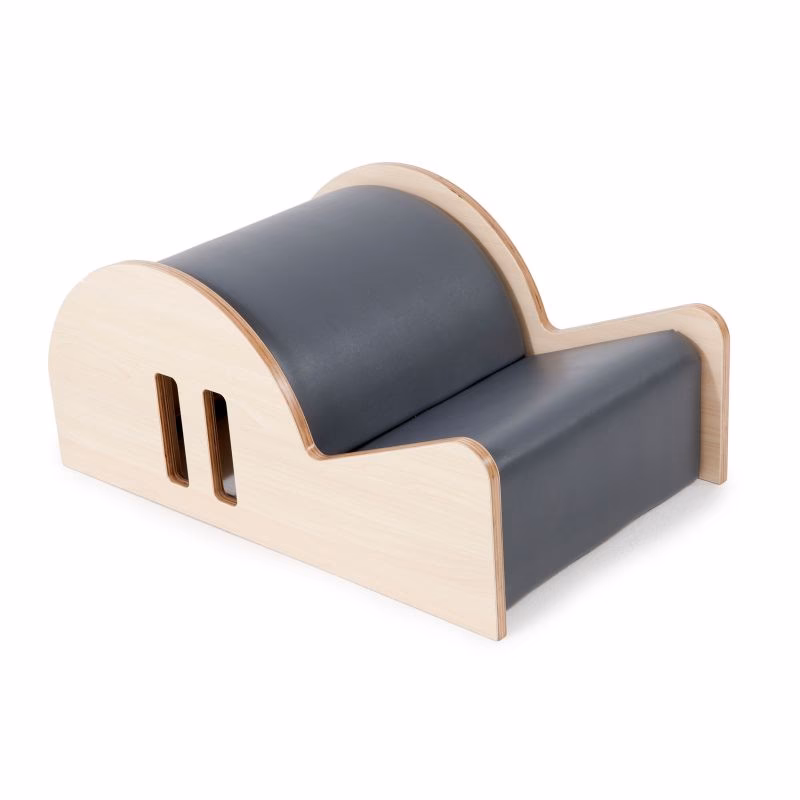 What does a Pilates spine corrector do?