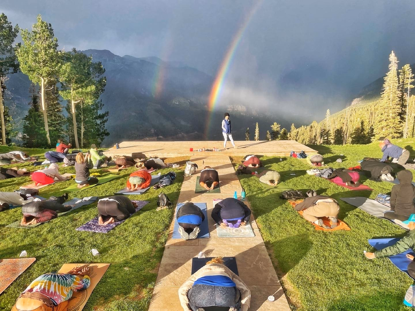 How many people attend the Telluride Yoga Festival?