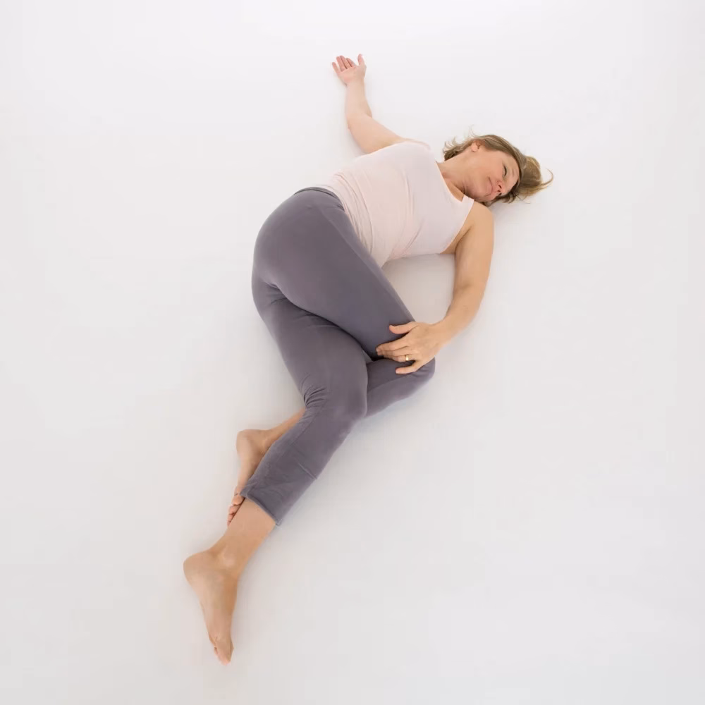 What are the benefits of yin yoga twisted roots?
