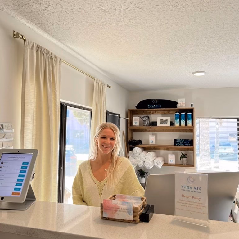 What does a yoga receptionist do?