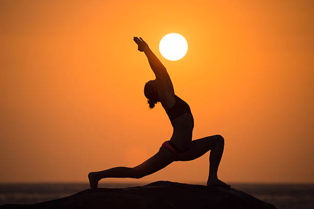 What are the benefits of sunset yoga?